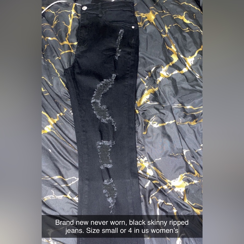 Black ripped skinny jeans